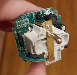 Close-up of internal components of WOOX R6128 smart plug.