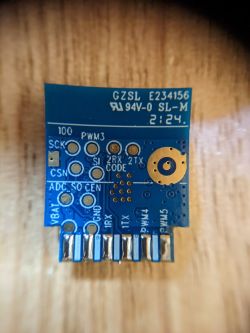 Image of a WIFI module with clearly visible pins and markings.