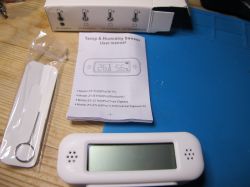 ZY-TH02Pro Sensor with Accessories Temperature and humidity sensor with a user manual and tool.