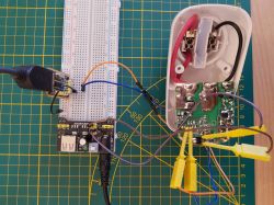OBI Module Connected to Breadboard Electronic module connected to a breadboard using wires.