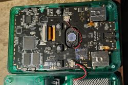 R36S-V21 game console PCB with visible speaker and added WiFi module