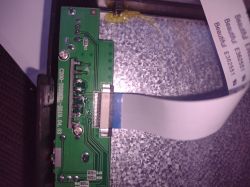 Image of a circuit board with a flat cable, model 7012b.