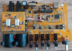 Circuit board with various electronic components.