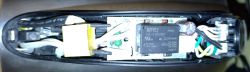 View of the interior components of a Hoffek AK3502 electric kettle with exposed electronic parts.