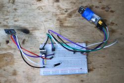 Prototype breadboard with wires and a USB module.