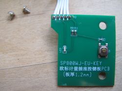 SP800WJ-EU-KEY PCB with Button PCB board with electronic components and a button.