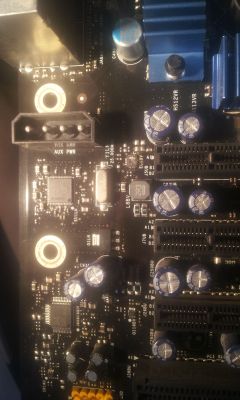 Intel DX58SO E29331-701 - Spalona przetwornica DC-DC (symbol EU6BV na płycie głó