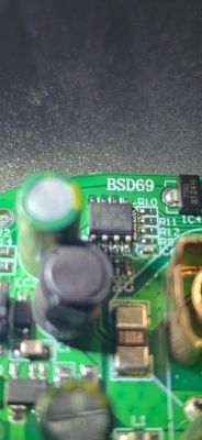 Close-up of green PCB labeled BSD69 with visible electronic components.