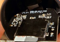 Close-up of a PCB labeled STD-X5-817-V02 with date code 20241101