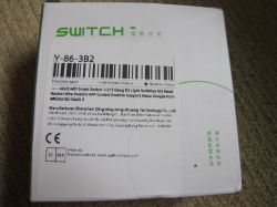 White product box with a large information sticker and barcode, labeled AXUS WiFi Smart Switch.