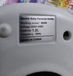 Tabliczka znamionowa czajnika Sejoy Electric Baby Formula Kettle z opisem parametrów technicznych.