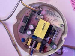 Interior of LEDVANCE Ceiling Light with Electronic Circuitry View of the interior of an LEDVANCE ceiling light with electronic components and wiring.