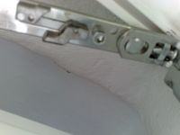 Plastic Double-Leaf Window (Movable Mullion): Wind Whistling & Blowing at Hinge, Upper Left Corner