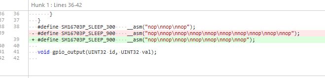 Code with asm macros in a text editor Code snippet in a text editor with asm macros for SLEEP functions.