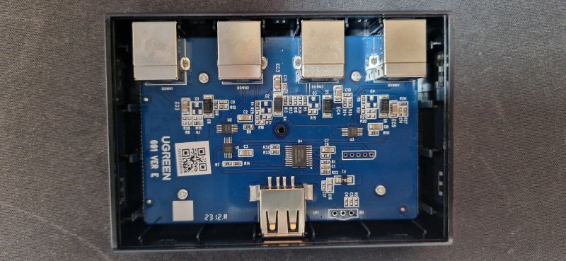 Internal Layout of Ugreen 30346 USB Switch Electronic layout of the Ugreen 30346 USB switch with visible components and USB ports.