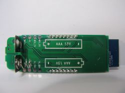 Bottom of ZY-TH02Pro Circuit Board Bottom of a circuit board with soldered electronic components and slots for AAA batteries.