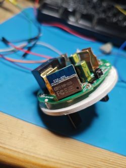 ESP-02S module mounted on a circuit board with several other components.