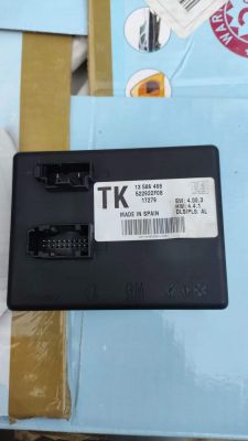 Moduł TK 13 586 468 pokazany na tle opakowania