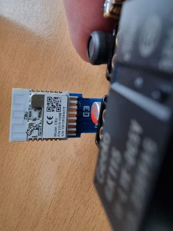 Electronic module with BK7231N chip in hand, visible markings CBU.