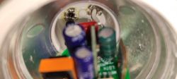 Interior of GU10 Bulb with Electronic Components Interior of an opened GU10 bulb showing electronic components and soldered wires.