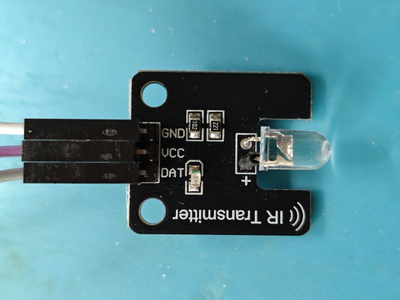 IR transmitter module with LED and three pins: GND, VCC, DAT