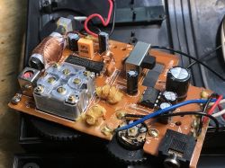 Inside View of Radio with CD2003GP Chip Radio PCB with electronic components, visible coils, capacitors, CD2003GP chip, and headphone jack.