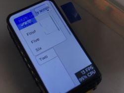 Zbliżenie na ekran ESP32-C6-LCD-1.47 z interfejsem listy i wskaźnikiem FPS