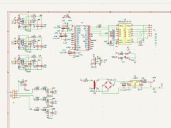 Schemat elektroniczny układu pomiarowego z układem ADE7758 oraz zasilaczem.
