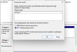 Disk initialization window in Windows with MBR and GPT options.