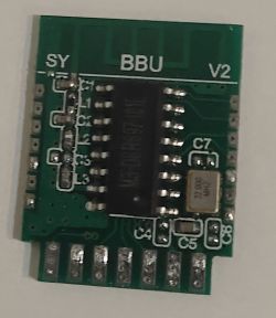 BBU module with SY and V2 markings and electronic components, including an integrated circuit and capacitors.