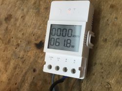 Sonoff POWR316D with an LCD display showing energy consumption.