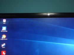 LG IPS234 - Część ekranu lekko różowa, zpikselowana, monitor zapamiętuje obraz