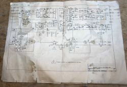 Old paper electrical schematic with visible stains and folds.