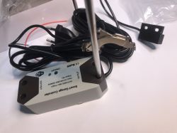 ATLO-GDC2-TUYA Garage Controller with Accessories ATLO-GDC2-TUYA garage door controller with power cord and long-cable sensor on a white background.