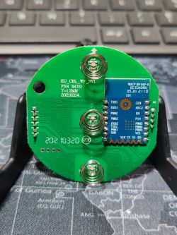 Printed Circuit Board with Electronic Module Printed circuit board with electronic components, including a module and connectors.