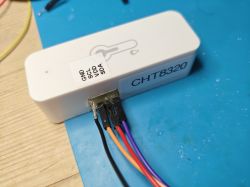 Plastic housing labeled CHT8320 with four copper wires on a blue background.