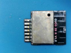 Electronic module CUCO Z0 R V1.2 on a blue background.