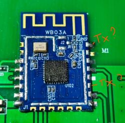Close-up of WB03A PCB module on green board with red handwritten notes “Tx?” and “-Tx?”