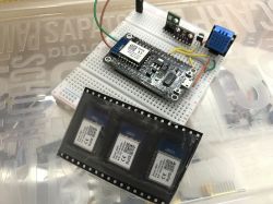 Close-up of a PCB prototype with electronic components on a breadboard.