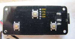 Circuit board panel with three buttons and labels: GND, 1TX, 1RX, and CEN.