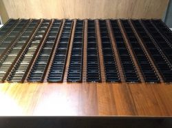 Battery Cell Holder Structure for 18650 Cells Array of empty battery cell holders on a table