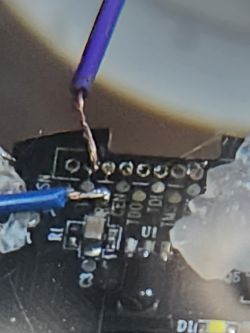 Soldered Wires on TuYa Wi-Fi IR PCB Close-up of a PCB with soldered TX/RX wires.