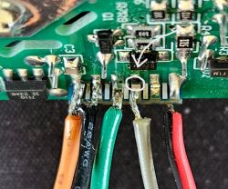 Wiring Connections to WB2S Chip on PCB Close-up of connected wires to the WB2S chip on a PCB.
