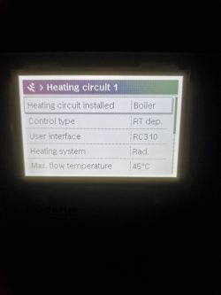 Heating system display showing configuration details.