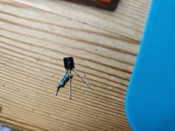 DS18B20 Sensor with Resistor DS18B20 sensor with resistor on a wooden table