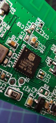 A circuit board with a chip labeled LIGHTNING LNB82HK1.