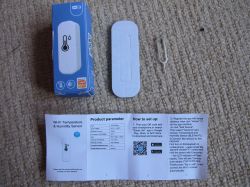 Wi-Fi Temperature and Humidity Sensor Kit Wi-Fi temperature and humidity sensor kit, user manual, and reset tool.