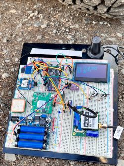GPS Prototype on a Breadboard GPS device prototype on a breadboard with connected various electronic components.