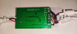 LED RGB Controller WX300P - PCB PCB of the LED RGB controller WX300P labeled SHY690-v1.4 with attached wires.