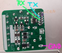 PCB with labeled pinouts A printed circuit board with RX, TX, CEN, and GND pins labeled in color markers.